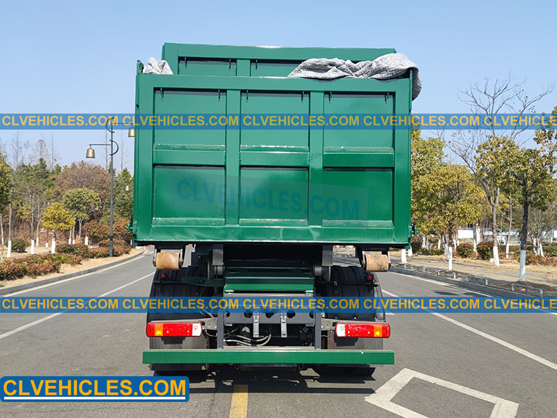 Hook arm garbage truck