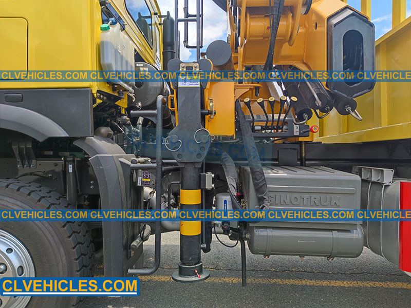 Flatbed cargo truck with crane
